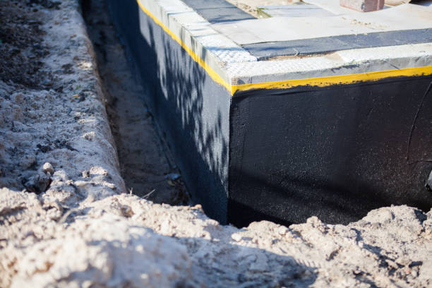 Professional Waterproofing technician working in Morrison, IL